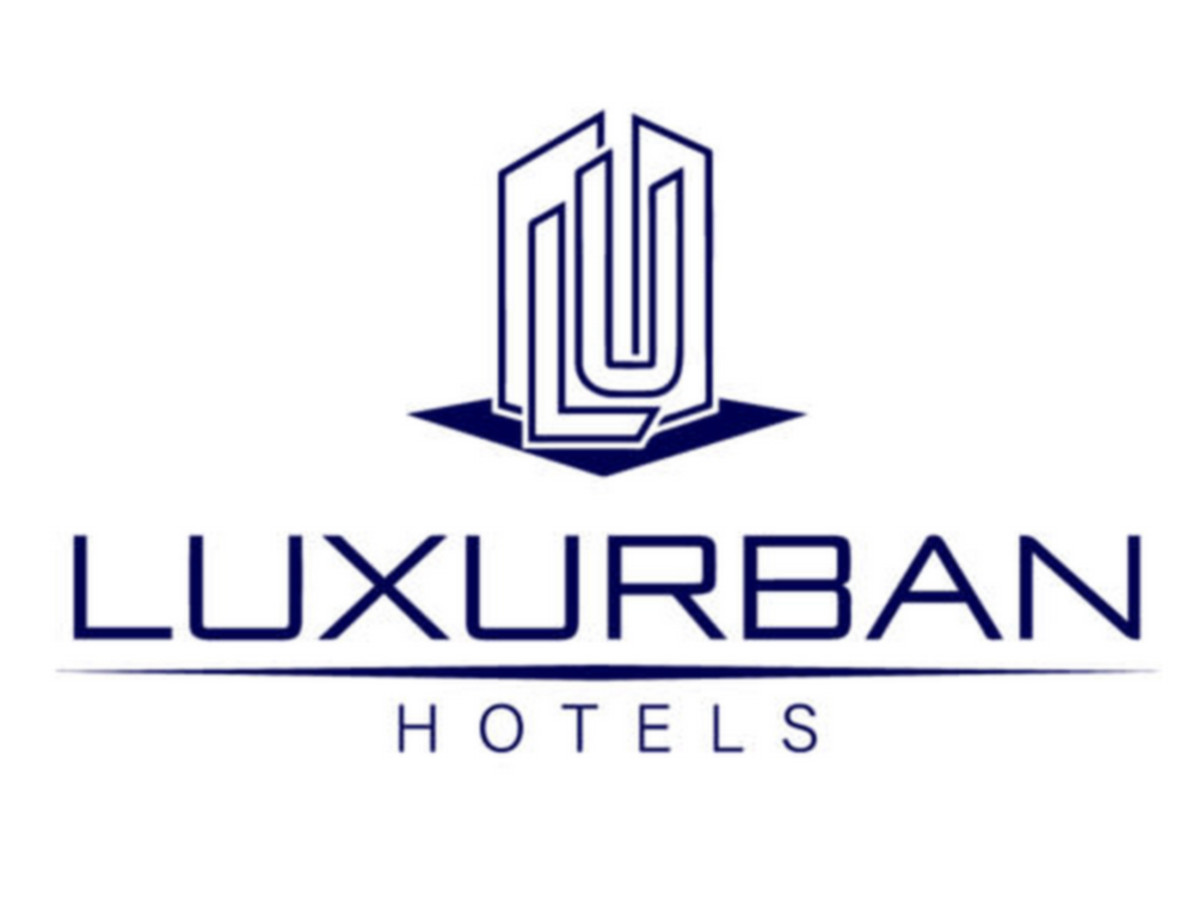 Logo perusahaan LuxUrban Hotels Inc. (LUXH) | 👁️GURU.Markets👁️ Logo korporat perusahaan LuxUrban Hotels Inc. (LUXH)